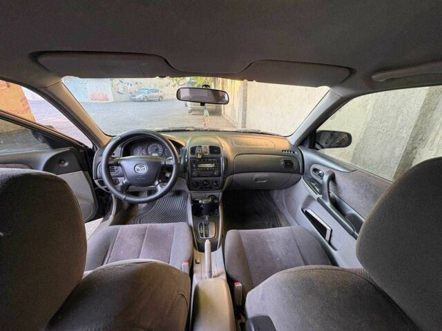 Синий Мазда 323, объемом двигателя 1.6 л и пробегом 400 тыс. км за 2200 $, фото 10 на Automoto.ua