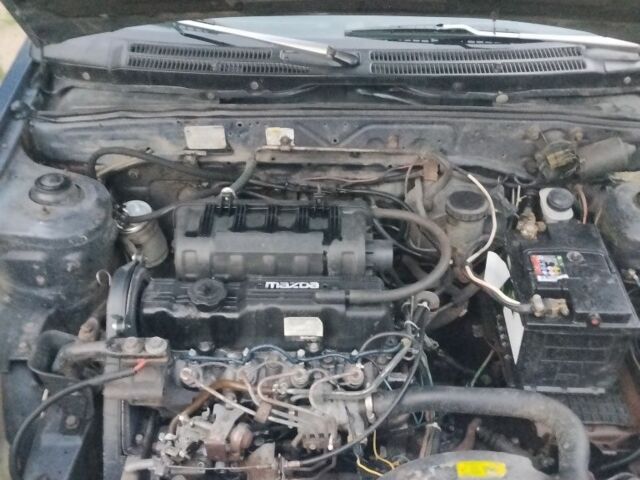 Синий Мазда 323, объемом двигателя 0 л и пробегом 300 тыс. км за 1117 $, фото 6 на Automoto.ua