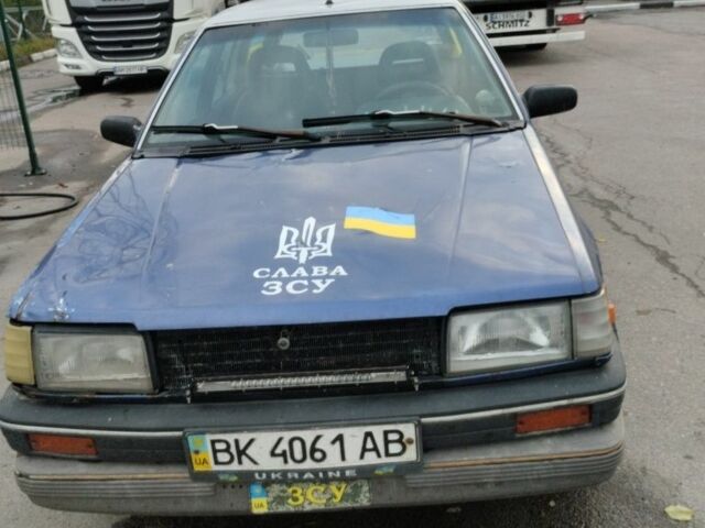 Синий Мазда 323, объемом двигателя 1.5 л и пробегом 100 тыс. км за 715 $, фото 1 на Automoto.ua