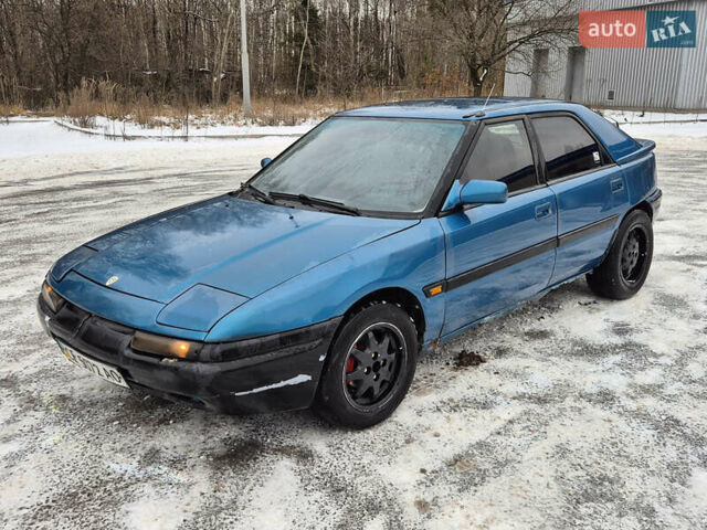 Синий Мазда 323, объемом двигателя 1.6 л и пробегом 195 тыс. км за 999 $, фото 1 на Automoto.ua