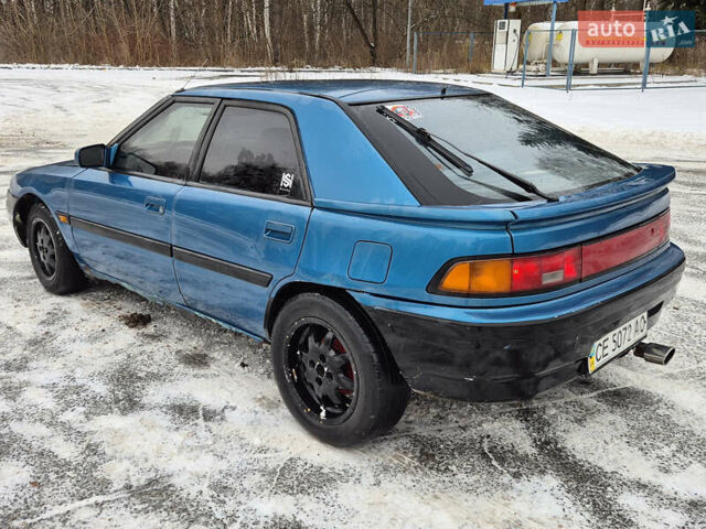 Синий Мазда 323, объемом двигателя 1.6 л и пробегом 195 тыс. км за 999 $, фото 2 на Automoto.ua