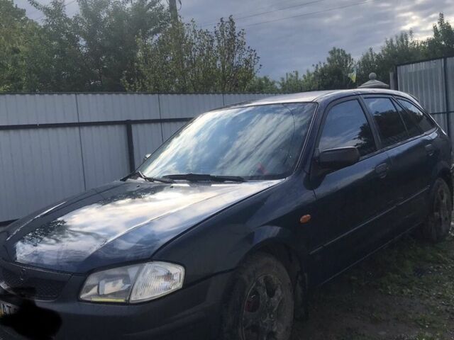 Синий Мазда 323, объемом двигателя 2 л и пробегом 248 тыс. км за 2092 $, фото 6 на Automoto.ua