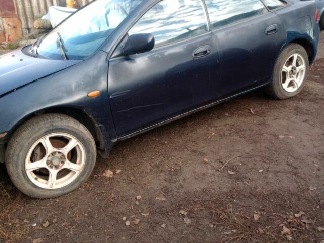 Синий Мазда 323, объемом двигателя 1.8 л и пробегом 345 тыс. км за 700 $, фото 3 на Automoto.ua