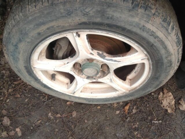 Синий Мазда 323, объемом двигателя 1.8 л и пробегом 345 тыс. км за 700 $, фото 5 на Automoto.ua