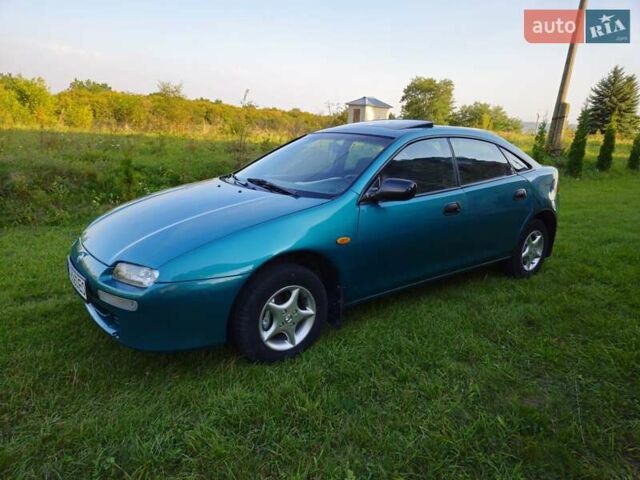 Зеленый Мазда 323, объемом двигателя 1.49 л и пробегом 359 тыс. км за 3199 $, фото 3 на Automoto.ua