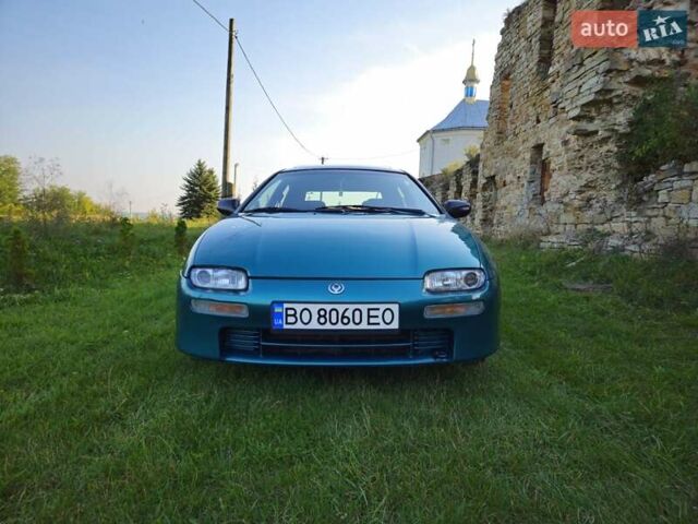 Зеленый Мазда 323, объемом двигателя 1.49 л и пробегом 359 тыс. км за 3199 $, фото 2 на Automoto.ua