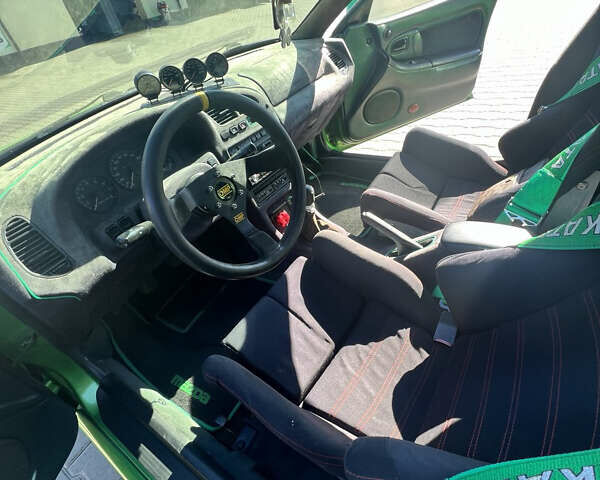 Зеленый Мазда 323, объемом двигателя 2 л и пробегом 200 тыс. км за 4200 $, фото 12 на Automoto.ua