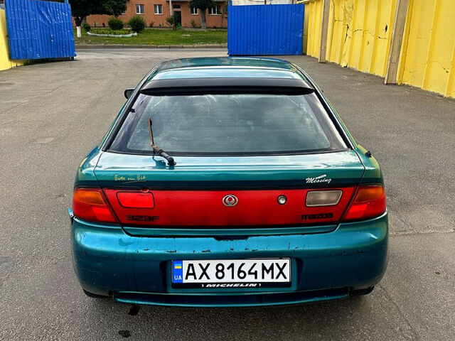 Зеленый Мазда 323, объемом двигателя 1.5 л и пробегом 250 тыс. км за 1350 $, фото 4 на Automoto.ua
