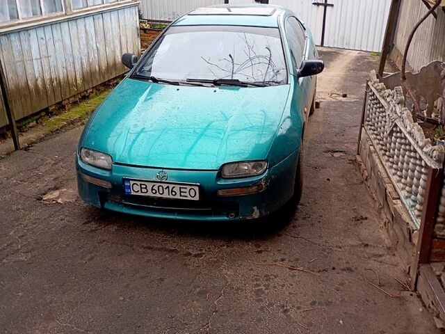 Зеленый Мазда 323, объемом двигателя 1.5 л и пробегом 0 тыс. км за 2000 $, фото 1 на Automoto.ua