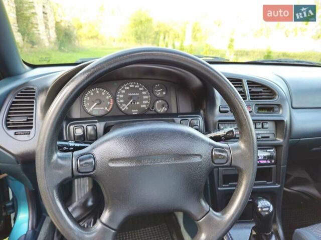 Зеленый Мазда 323, объемом двигателя 1.49 л и пробегом 359 тыс. км за 3199 $, фото 1 на Automoto.ua