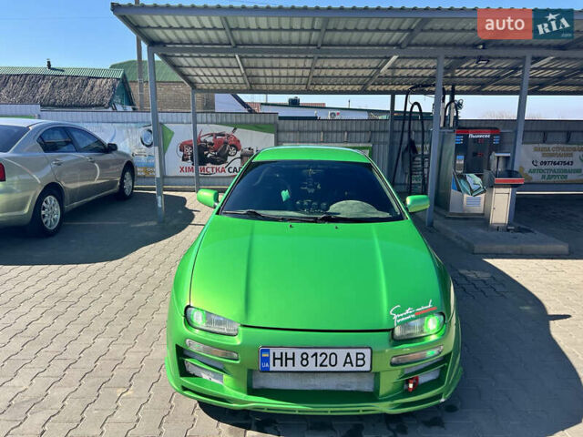 Зеленый Мазда 323, объемом двигателя 2 л и пробегом 200 тыс. км за 4200 $, фото 5 на Automoto.ua