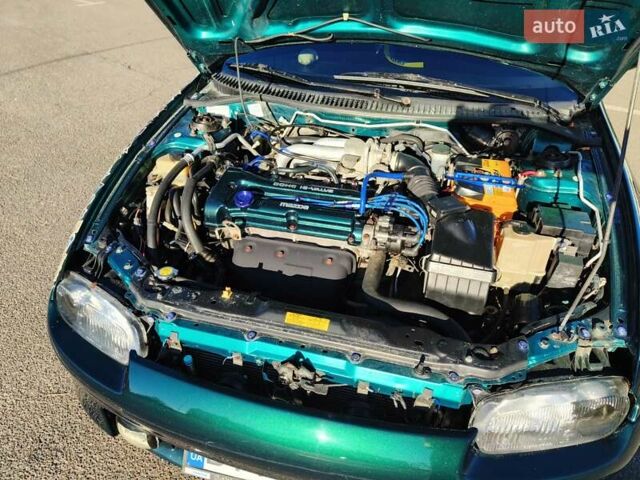 Зеленый Мазда 323, объемом двигателя 1.5 л и пробегом 433 тыс. км за 2700 $, фото 23 на Automoto.ua