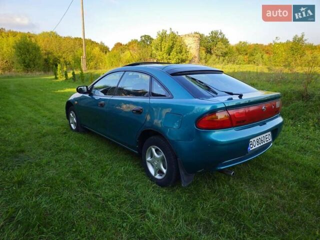 Зеленый Мазда 323, объемом двигателя 1.49 л и пробегом 359 тыс. км за 3199 $, фото 6 на Automoto.ua