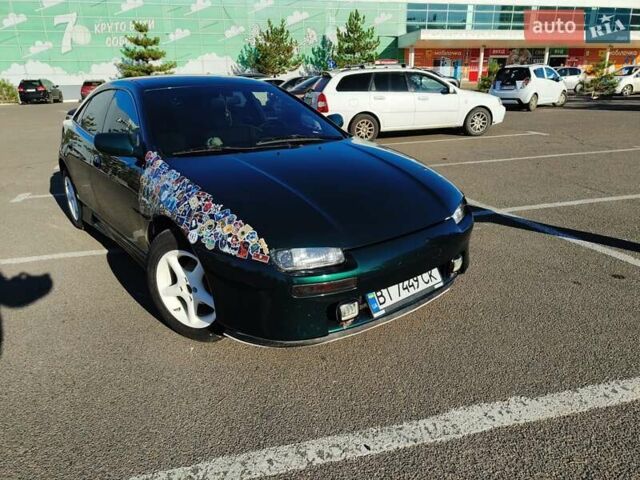 Зеленый Мазда 323, объемом двигателя 1.5 л и пробегом 433 тыс. км за 2700 $, фото 12 на Automoto.ua