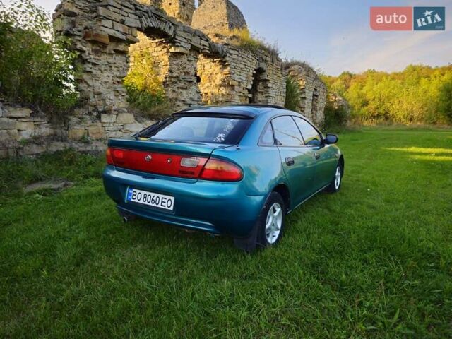 Зеленый Мазда 323, объемом двигателя 1.49 л и пробегом 359 тыс. км за 3199 $, фото 11 на Automoto.ua