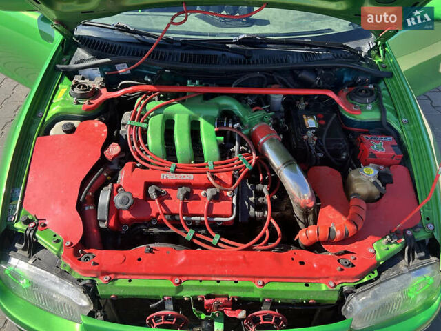 Зеленый Мазда 323, объемом двигателя 2 л и пробегом 200 тыс. км за 4200 $, фото 9 на Automoto.ua