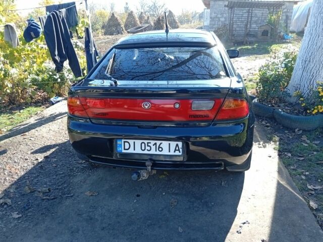 Зеленый Мазда 323, объемом двигателя 1.5 л и пробегом 227 тыс. км за 2500 $, фото 3 на Automoto.ua