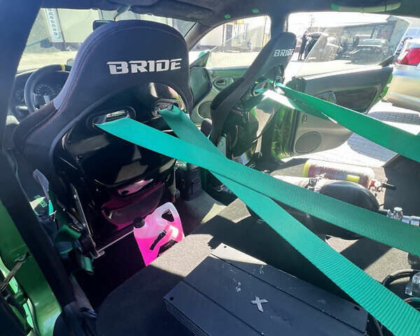 Зеленый Мазда 323, объемом двигателя 2 л и пробегом 200 тыс. км за 4200 $, фото 13 на Automoto.ua