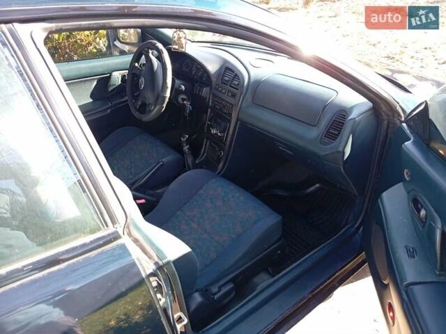 Зелений Мазда 323, об'ємом двигуна 1.49 л та пробігом 280 тис. км за 2500 $, фото 1 на Automoto.ua