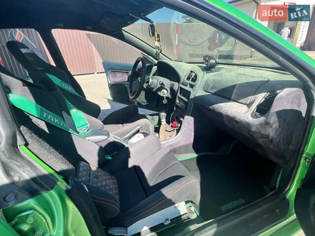 Зеленый Мазда 323, объемом двигателя 2 л и пробегом 200 тыс. км за 4200 $, фото 11 на Automoto.ua