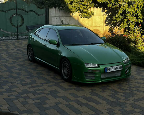 Зеленый Мазда 323, объемом двигателя 2 л и пробегом 200 тыс. км за 4200 $, фото 15 на Automoto.ua