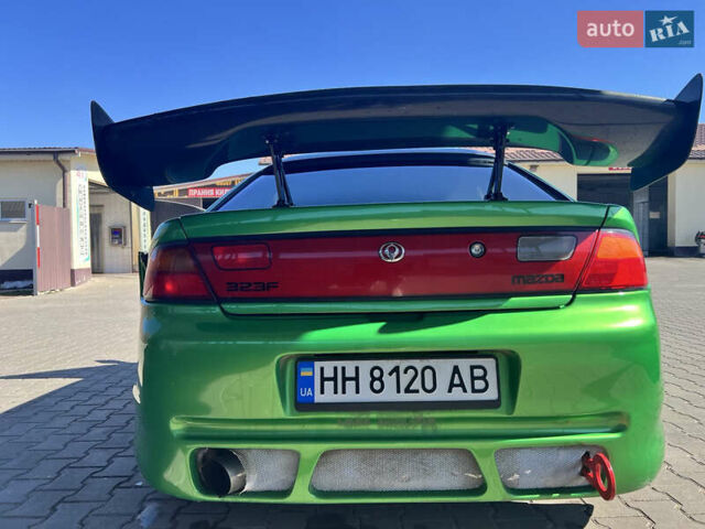 Зеленый Мазда 323, объемом двигателя 2 л и пробегом 200 тыс. км за 4200 $, фото 10 на Automoto.ua