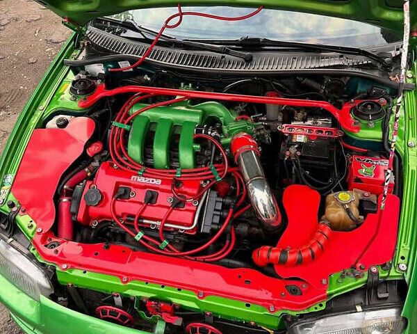 Зеленый Мазда 323, объемом двигателя 2 л и пробегом 200 тыс. км за 4200 $, фото 3 на Automoto.ua