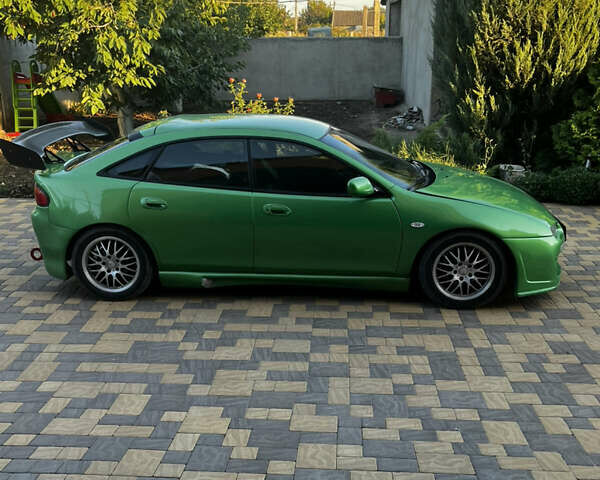 Зеленый Мазда 323, объемом двигателя 2 л и пробегом 200 тыс. км за 4200 $, фото 14 на Automoto.ua