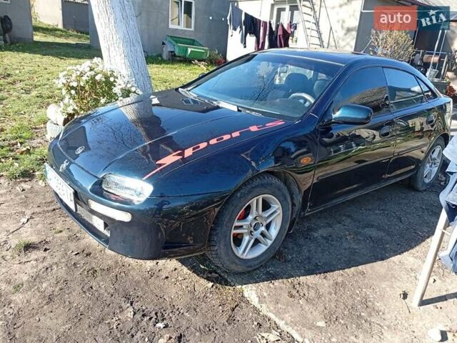 Зелений Мазда 323, об'ємом двигуна 1.49 л та пробігом 280 тис. км за 2500 $, фото 8 на Automoto.ua