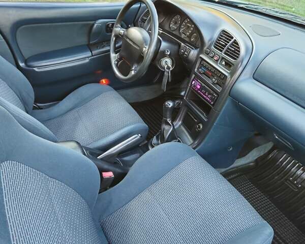 Зеленый Мазда 323, объемом двигателя 1.49 л и пробегом 359 тыс. км за 3199 $, фото 5 на Automoto.ua