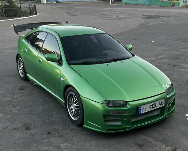 Зеленый Мазда 323, объемом двигателя 2 л и пробегом 200 тыс. км за 4200 $, фото 18 на Automoto.ua