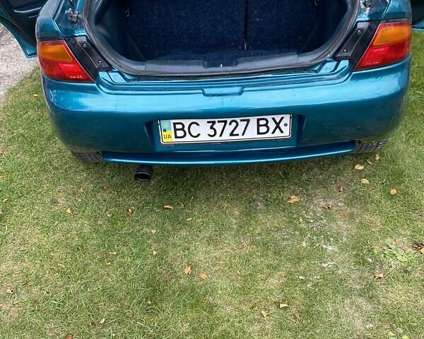 Зеленый Мазда 323, объемом двигателя 1.49 л и пробегом 322 тыс. км за 2600 $, фото 13 на Automoto.ua