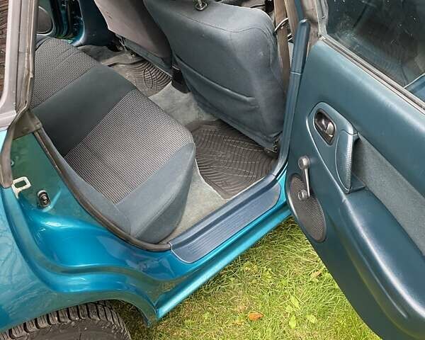 Зеленый Мазда 323, объемом двигателя 1.49 л и пробегом 322 тыс. км за 2600 $, фото 11 на Automoto.ua