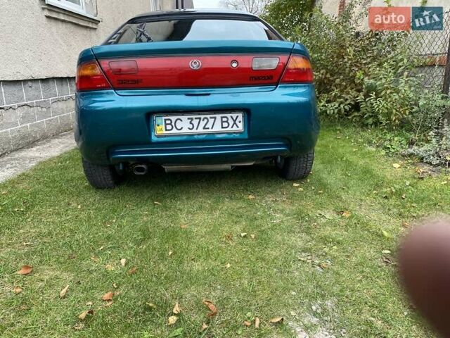 Зеленый Мазда 323, объемом двигателя 1.49 л и пробегом 322 тыс. км за 2600 $, фото 3 на Automoto.ua