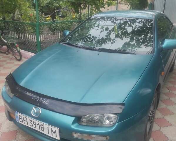 Зеленый Мазда 323, объемом двигателя 1.5 л и пробегом 323 тыс. км за 2200 $, фото 1 на Automoto.ua
