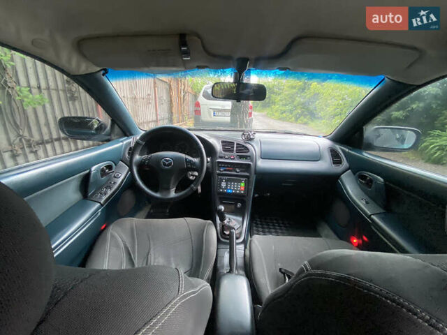 Зеленый Мазда 323, объемом двигателя 1.5 л и пробегом 426 тыс. км за 2300 $, фото 5 на Automoto.ua