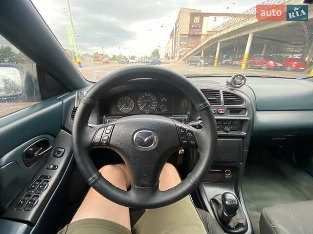 Зеленый Мазда 323, объемом двигателя 1.5 л и пробегом 426 тыс. км за 2300 $, фото 4 на Automoto.ua