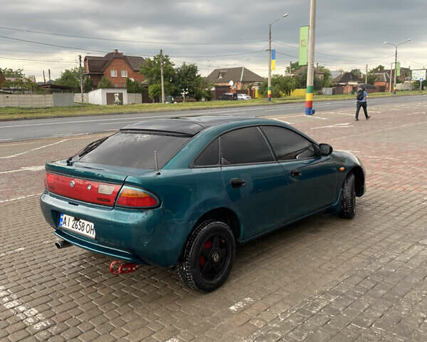 Зеленый Мазда 323, объемом двигателя 1.5 л и пробегом 426 тыс. км за 2300 $, фото 2 на Automoto.ua