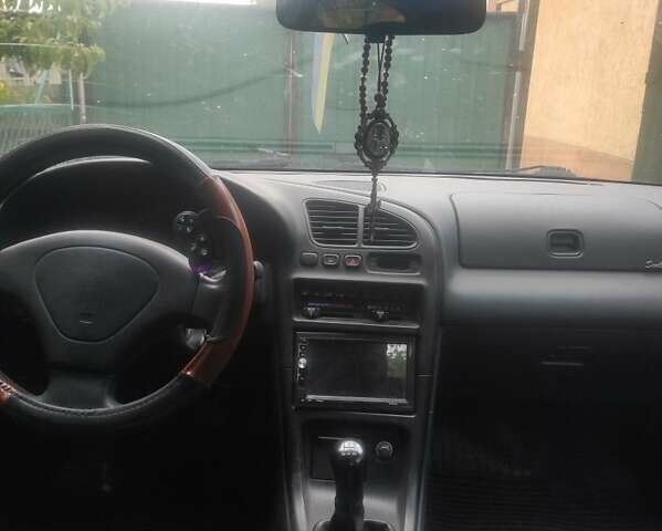 Зеленый Мазда 323, объемом двигателя 1.5 л и пробегом 323 тыс. км за 2200 $, фото 5 на Automoto.ua