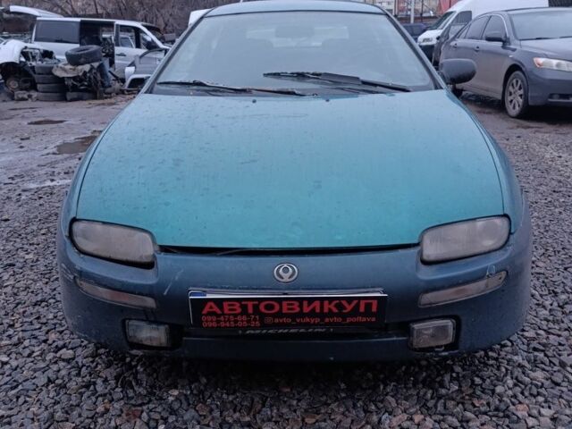 Зеленый Мазда 323, объемом двигателя 1.5 л и пробегом 300 тыс. км за 699 $, фото 3 на Automoto.ua