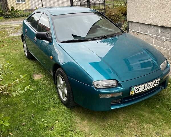 Зеленый Мазда 323, объемом двигателя 1.49 л и пробегом 322 тыс. км за 2600 $, фото 7 на Automoto.ua