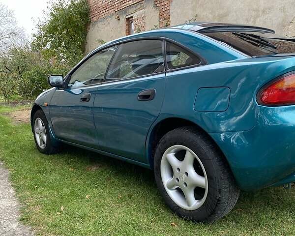 Зеленый Мазда 323, объемом двигателя 1.5 л и пробегом 323 тыс. км за 2600 $, фото 7 на Automoto.ua