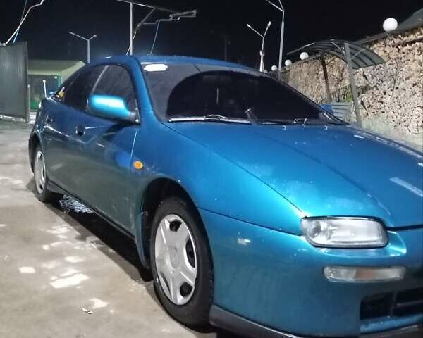 Зеленый Мазда 323, объемом двигателя 1.5 л и пробегом 350 тыс. км за 2750 $, фото 14 на Automoto.ua