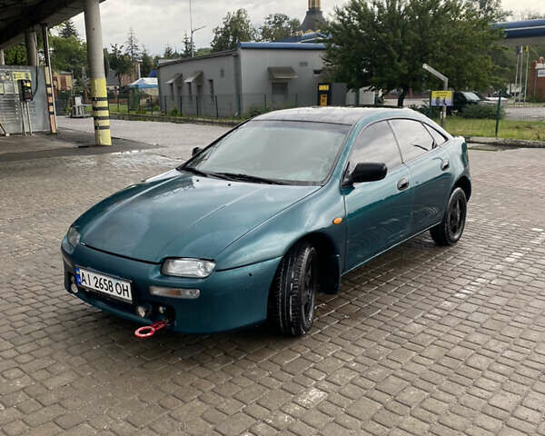 Зеленый Мазда 323, объемом двигателя 1.5 л и пробегом 426 тыс. км за 2300 $, фото 3 на Automoto.ua