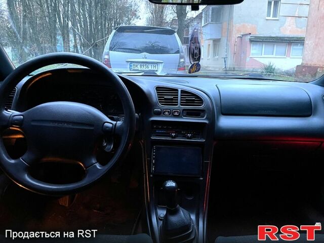 Зеленый Мазда 323, объемом двигателя 1.5 л и пробегом 334 тыс. км за 1800 $, фото 4 на Automoto.ua