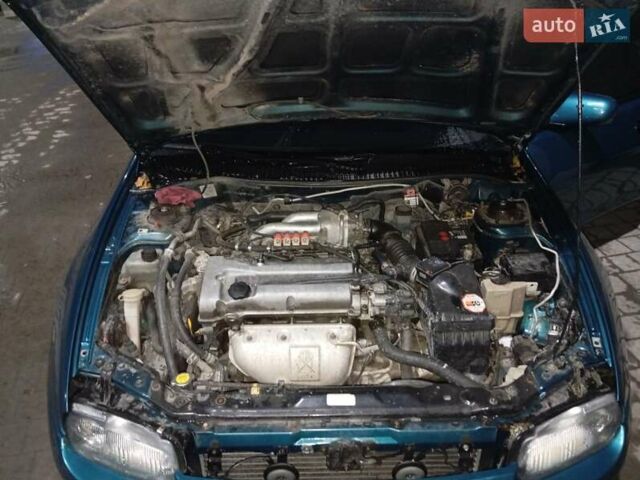 Зеленый Мазда 323, объемом двигателя 1.5 л и пробегом 350 тыс. км за 2750 $, фото 5 на Automoto.ua