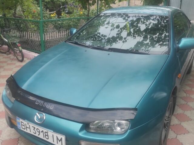 Зеленый Мазда 323, объемом двигателя 0 л и пробегом 323 тыс. км за 2200 $, фото 2 на Automoto.ua