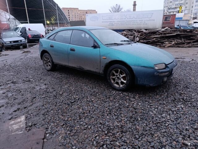 Зеленый Мазда 323, объемом двигателя 1.5 л и пробегом 300 тыс. км за 699 $, фото 1 на Automoto.ua