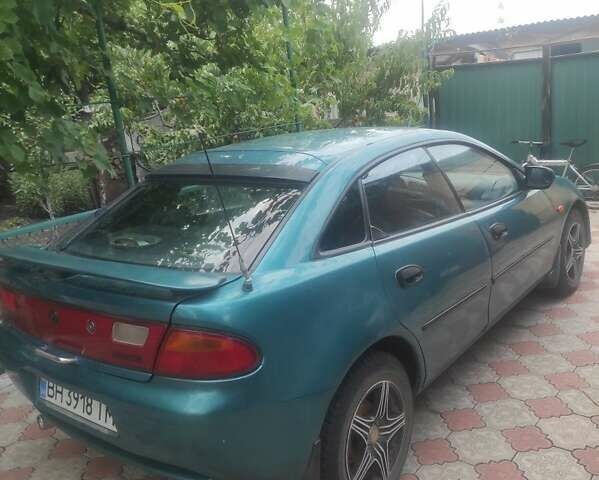 Зеленый Мазда 323, объемом двигателя 1.5 л и пробегом 323 тыс. км за 2200 $, фото 4 на Automoto.ua