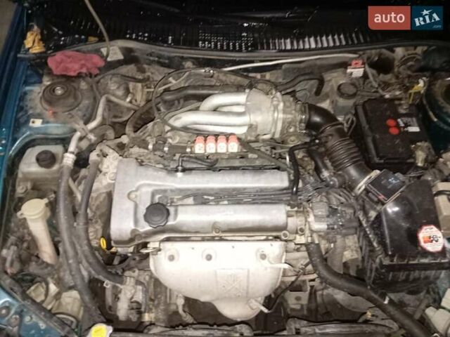 Зеленый Мазда 323, объемом двигателя 1.5 л и пробегом 350 тыс. км за 2750 $, фото 4 на Automoto.ua